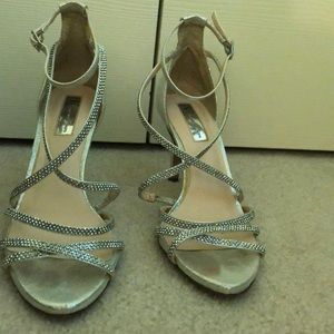 Strappy silver heels